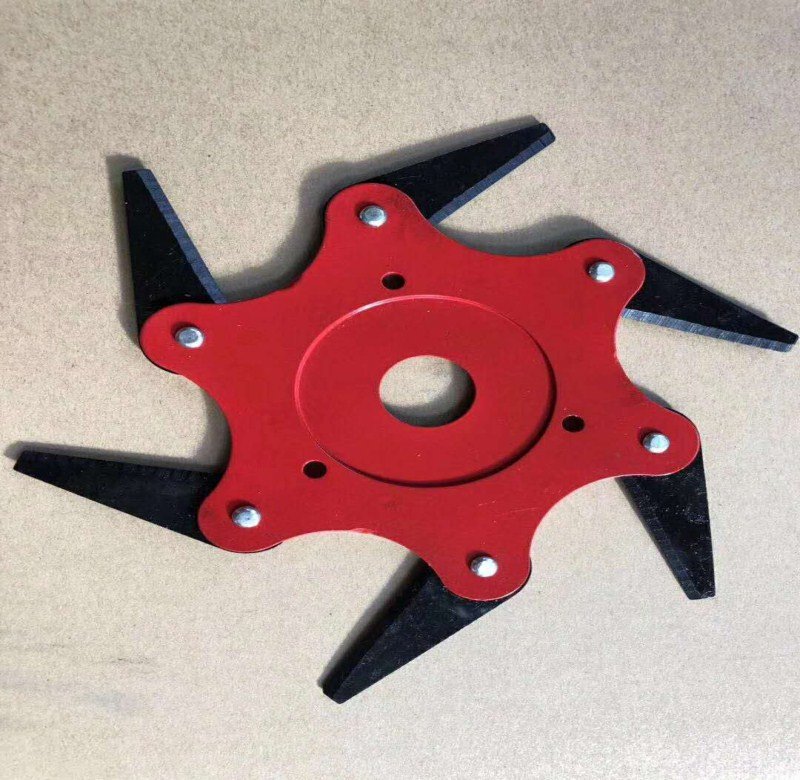 The grass trimmer uses multi-bladed manganese steel blades. - Image 4